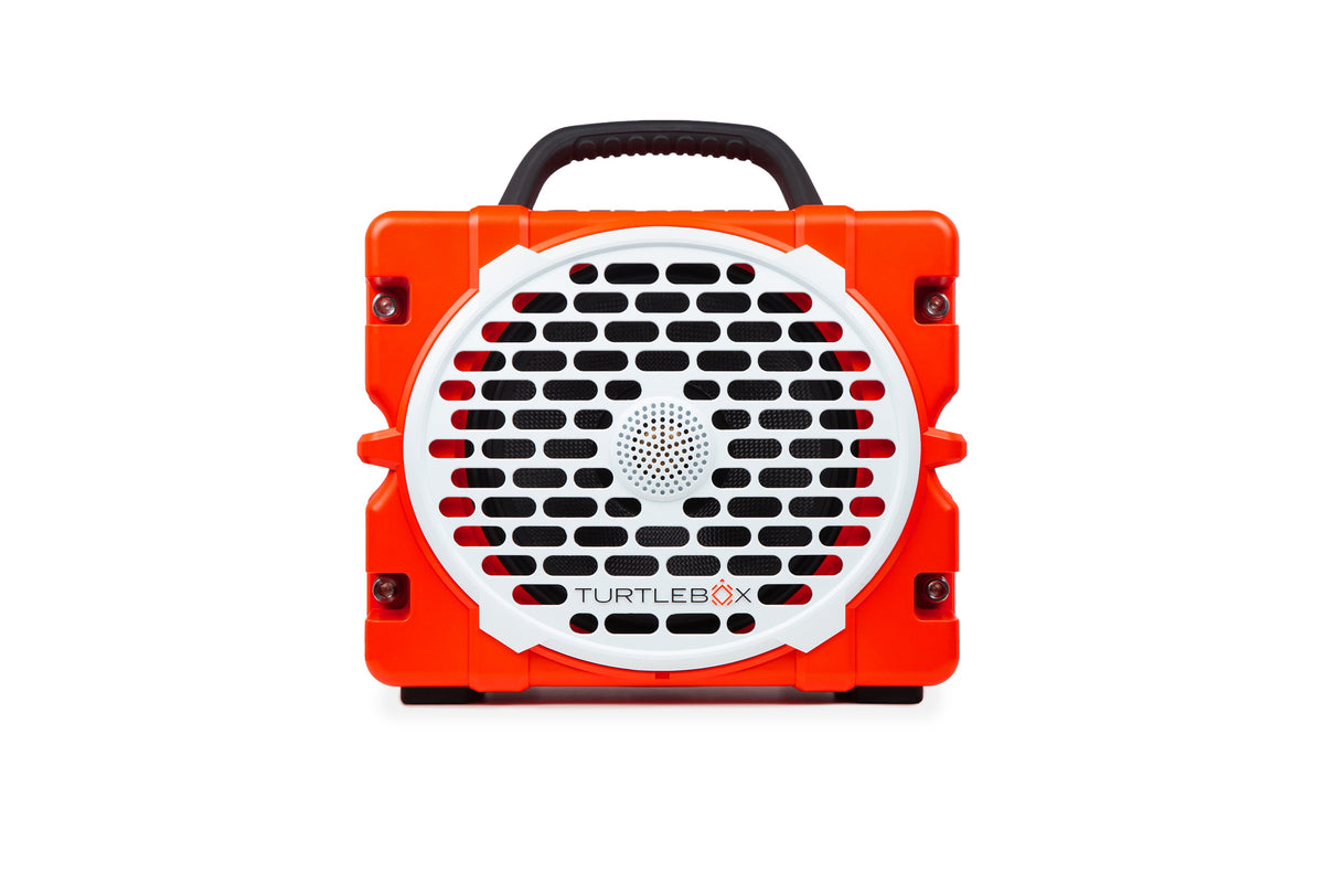 Orange and White portable Turtlebox speaker on a white background