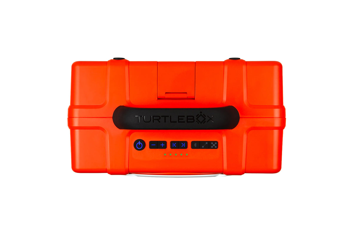 Orange and White portable Turtlebox speaker top-view on a white background