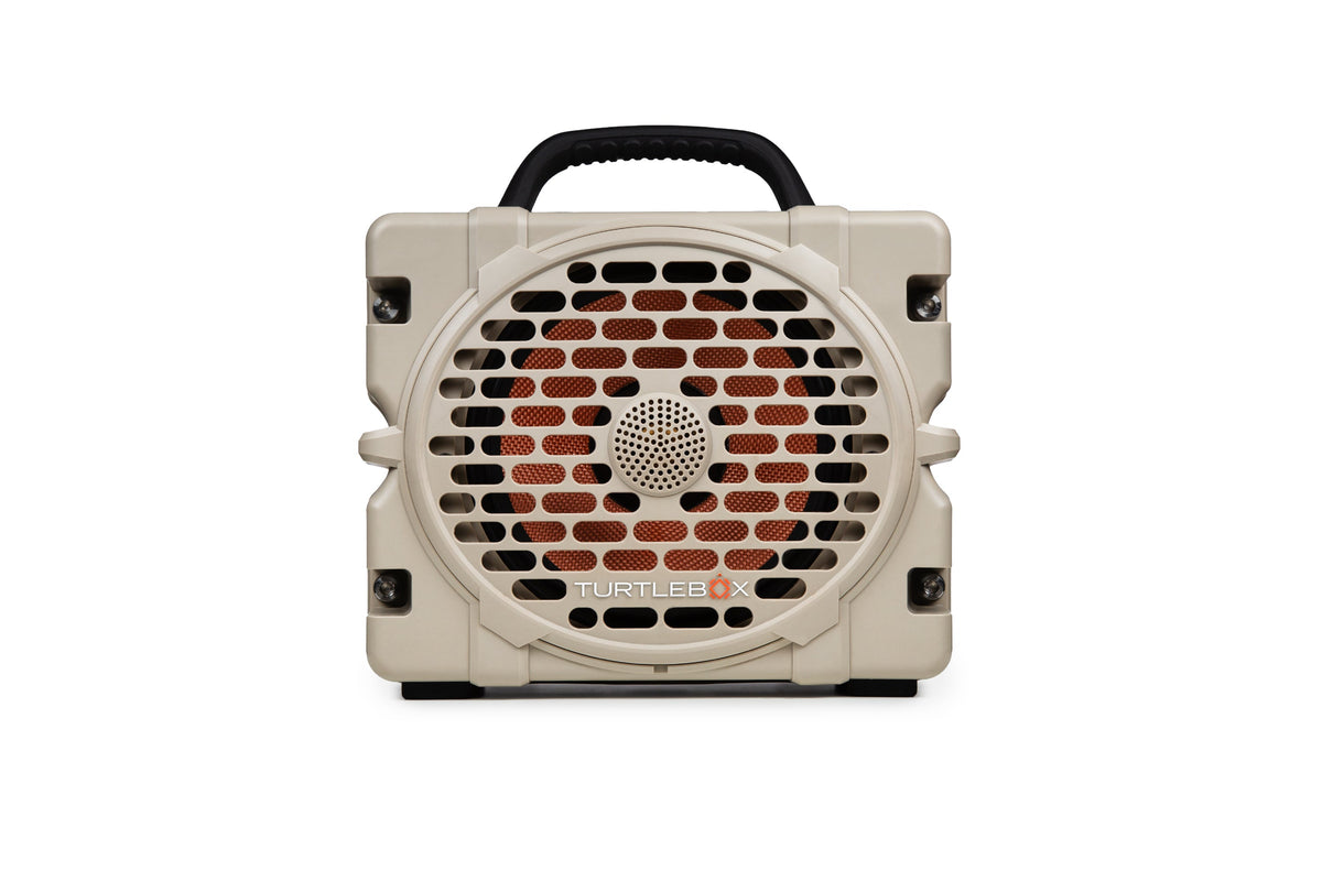 Tan portable Turtlebox speaker on a white background