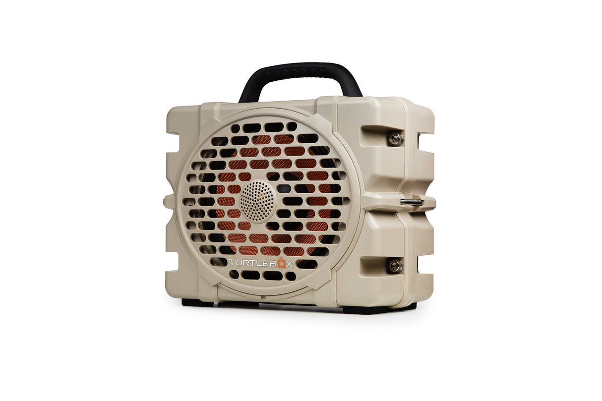 Tan portable Turtlebox speaker on a white background