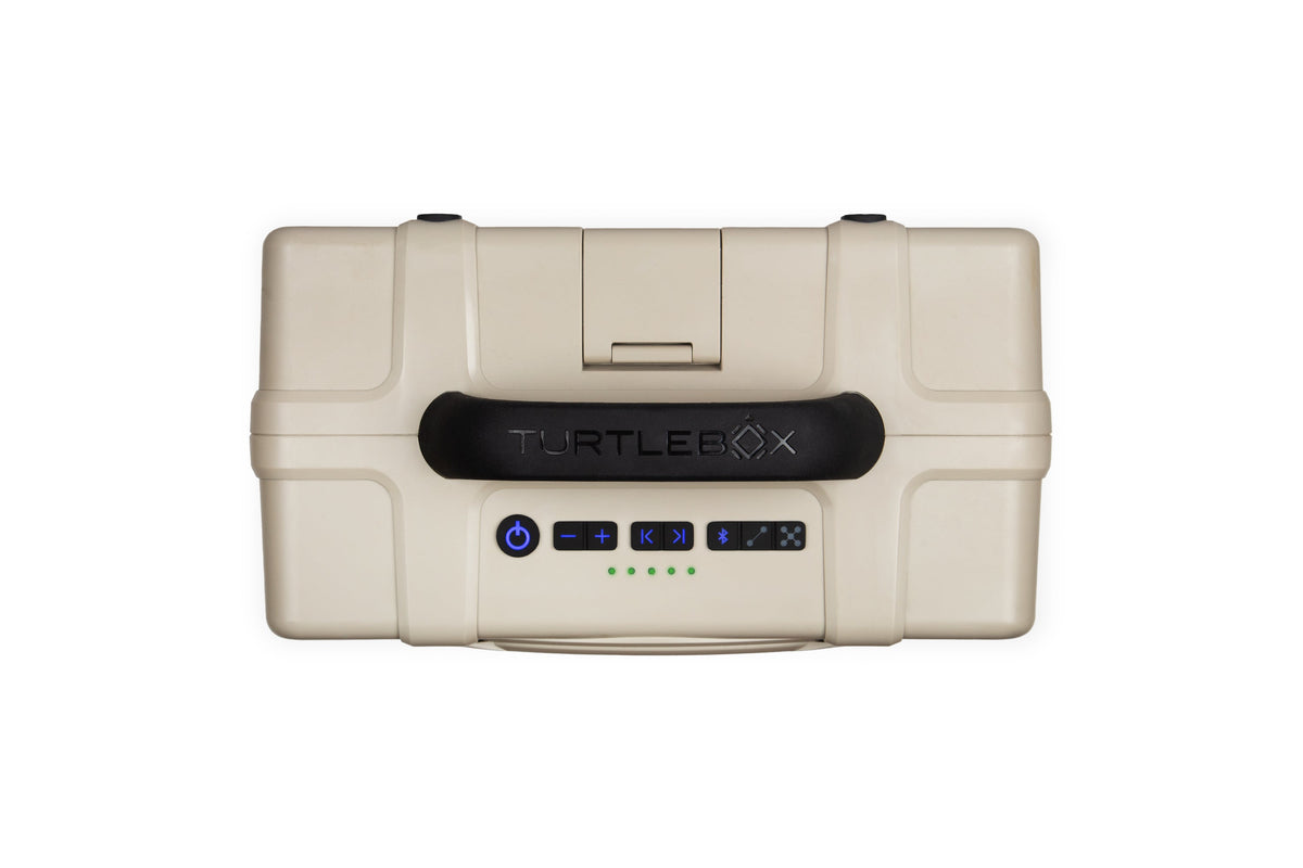 Tan and White portable Turtlebox speaker top-view on a white background