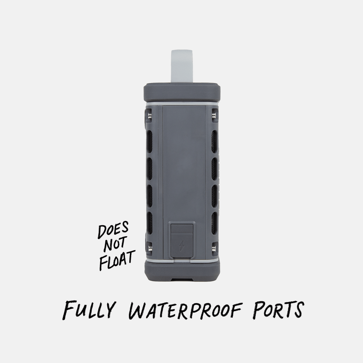 Gray waterproof Turtlebox speaker with text indicating it does not float and has fully waterproof ports on a white background.