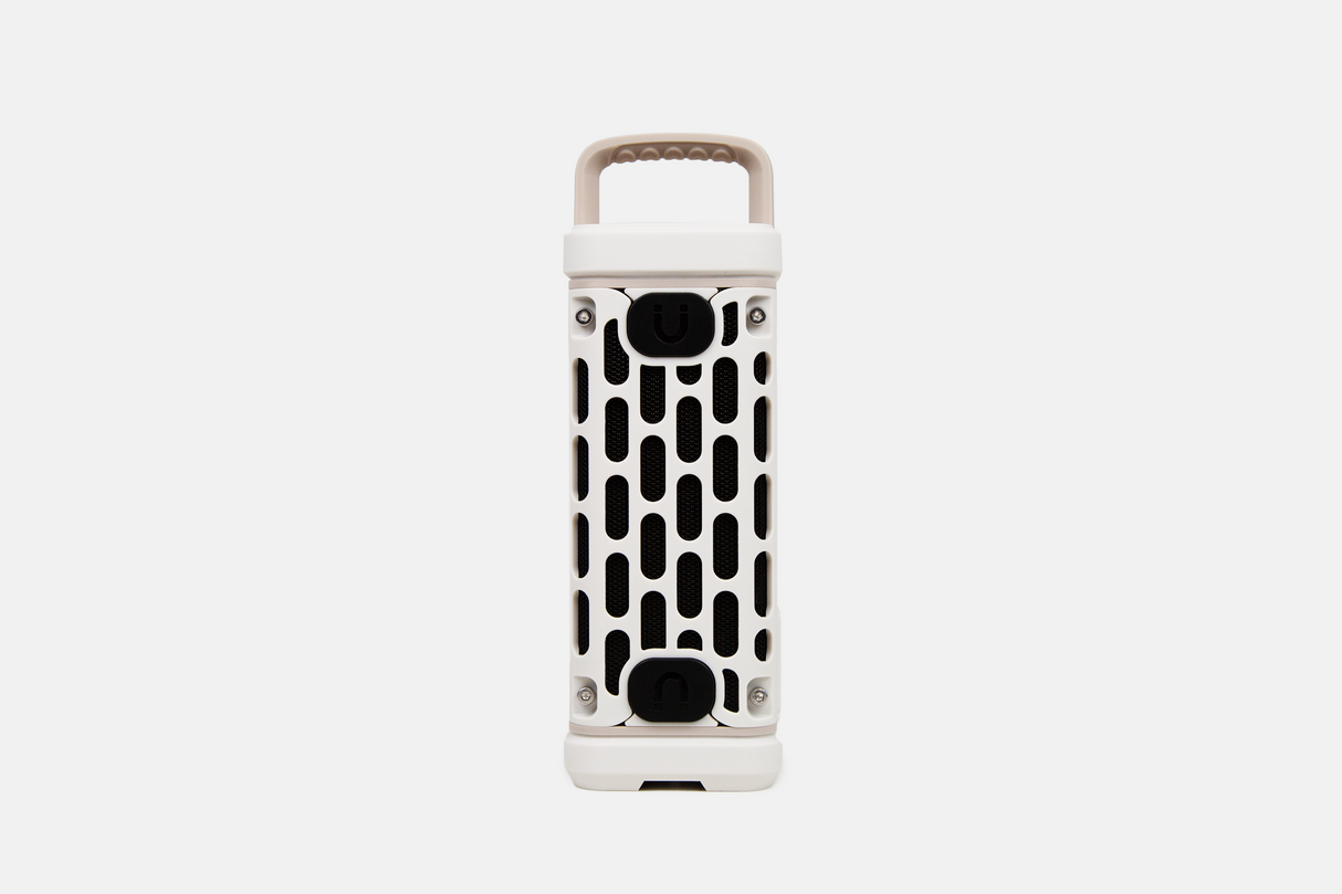 White portable Turtlebox speaker on a white background