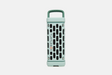 Mint green portable Turtlebox speaker  on a white background